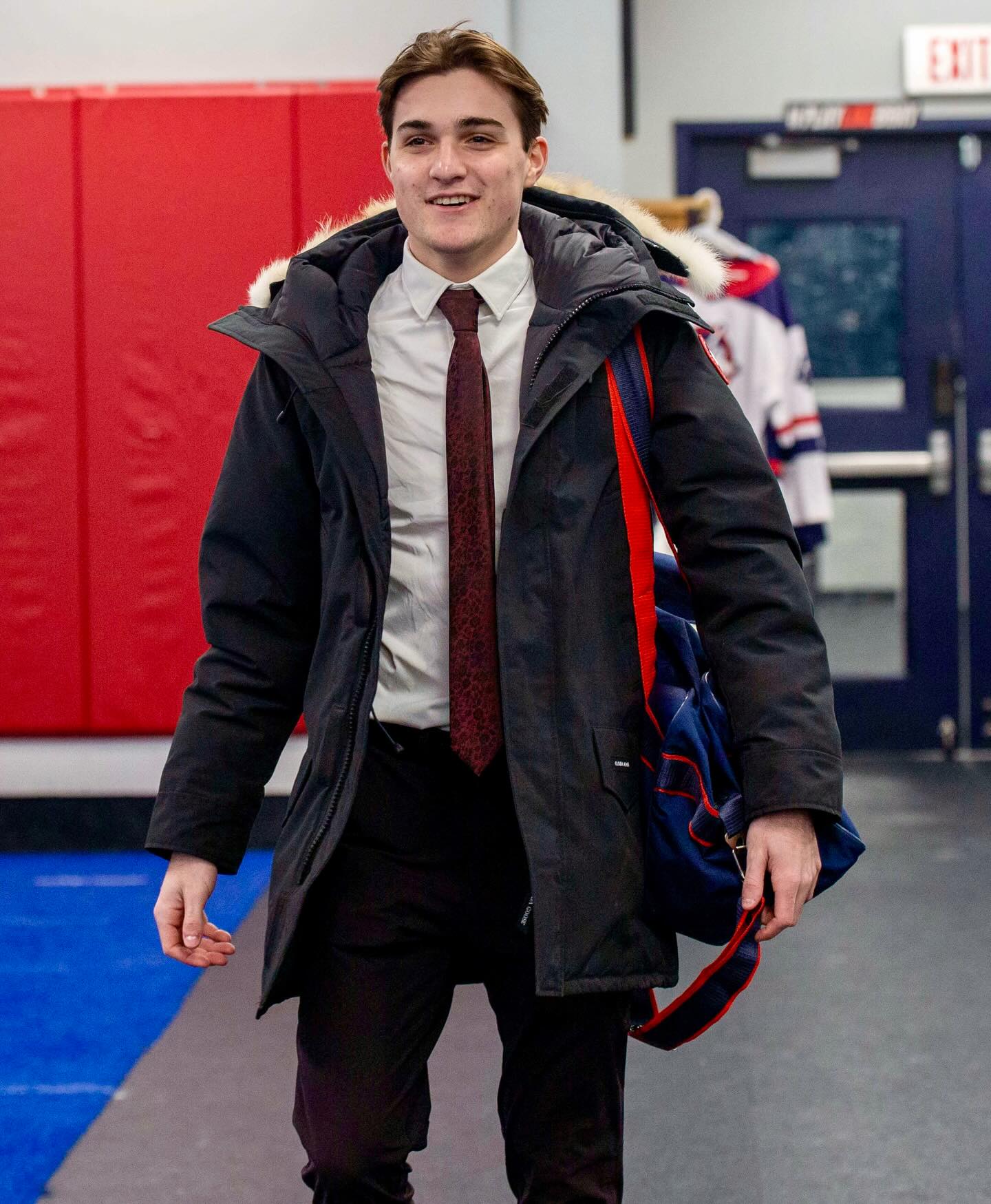 #MetroJets forward Robert Vanderdonck flashes a smile on his way to the locker room at Mount Clemens Ice Arena prior to a game during the 2023-24 season. 

#PlayerEntranceThursday #PlayLikeBray