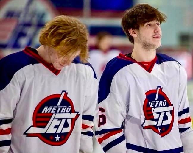 #MetroJets teammates Jarrett LaGrow and Sean O’Connor stand for the “Star Spangled Banner” as part of the starting lineup before a #MetroJetsElite game at Mount Clemens Ice Arena during the 2024-25 season. 

#TwoForTuesday #PlayLikeBray