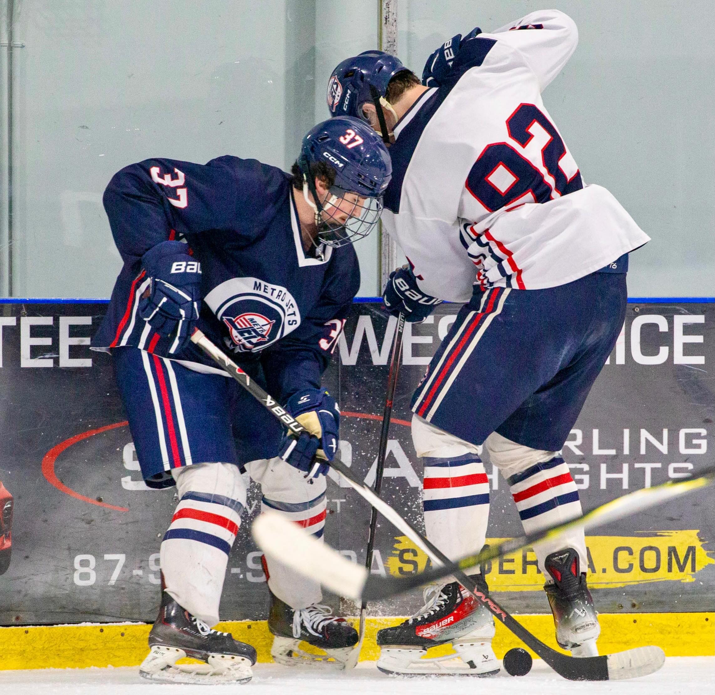 #MetroJets players Mario Boskovich (37) and Evan Cote (92) battle for the puck during a February 2026 practice at Mount Clemens Ice Arena.
#TwoForTuesday #PlayLikeBray